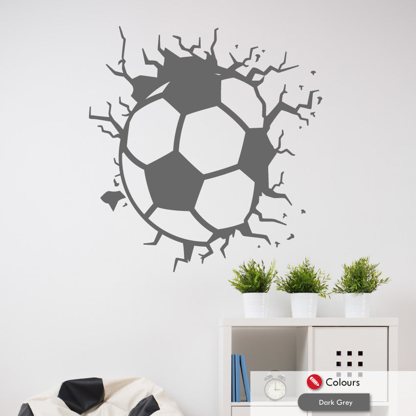 Football large wall decal cracking through the wall